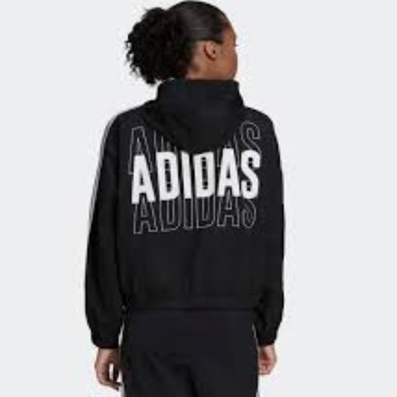 Brand New Women's Adidas ESSENTIALS REPEAT LOGO LOOSE-FIT WINDBREAKER - Picture 2 of 12